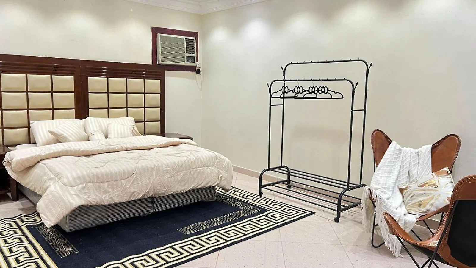 غرفة نوم وصالة بأثاث أنيق Apartemen Mecca